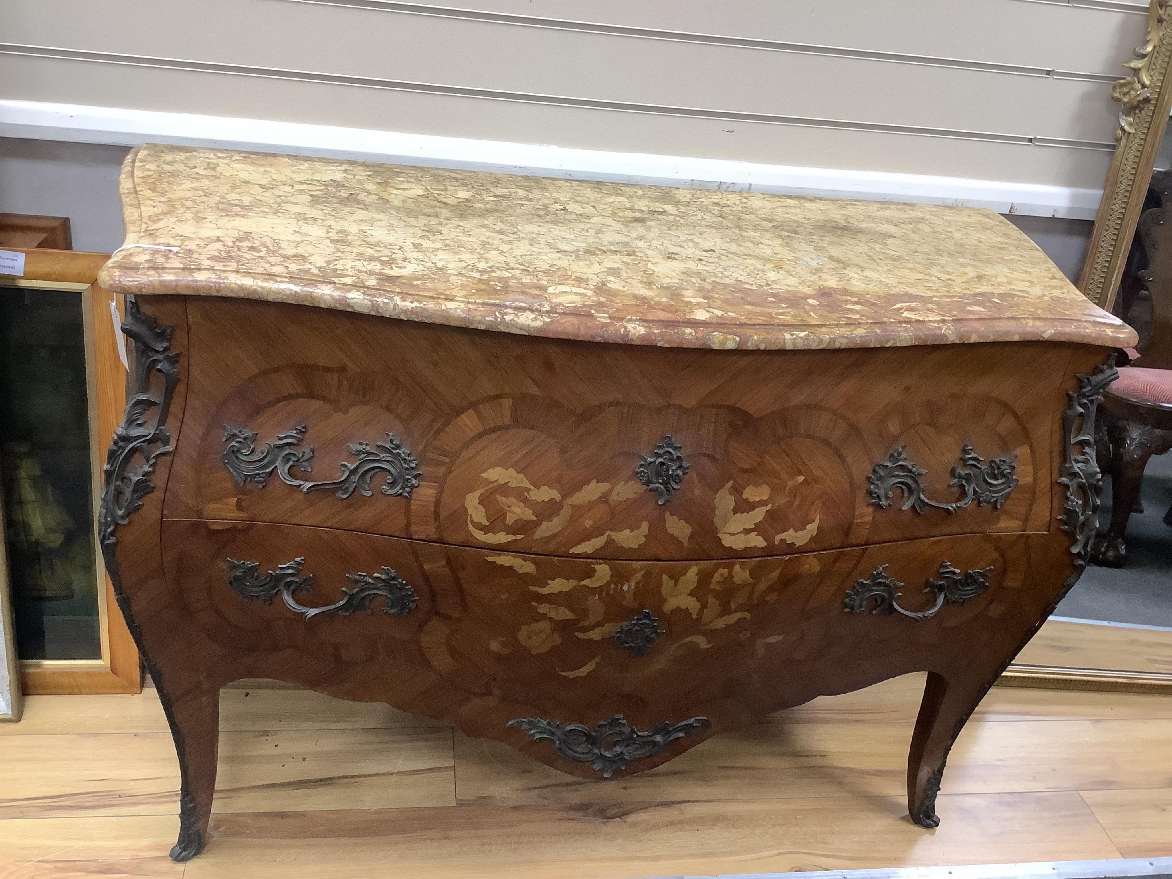 A French Louis XV style marble topped marquetry commode, width 127cm, depth 53cm, height 85cm. Condition - fair